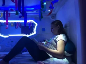 girl reading in the zpods bed